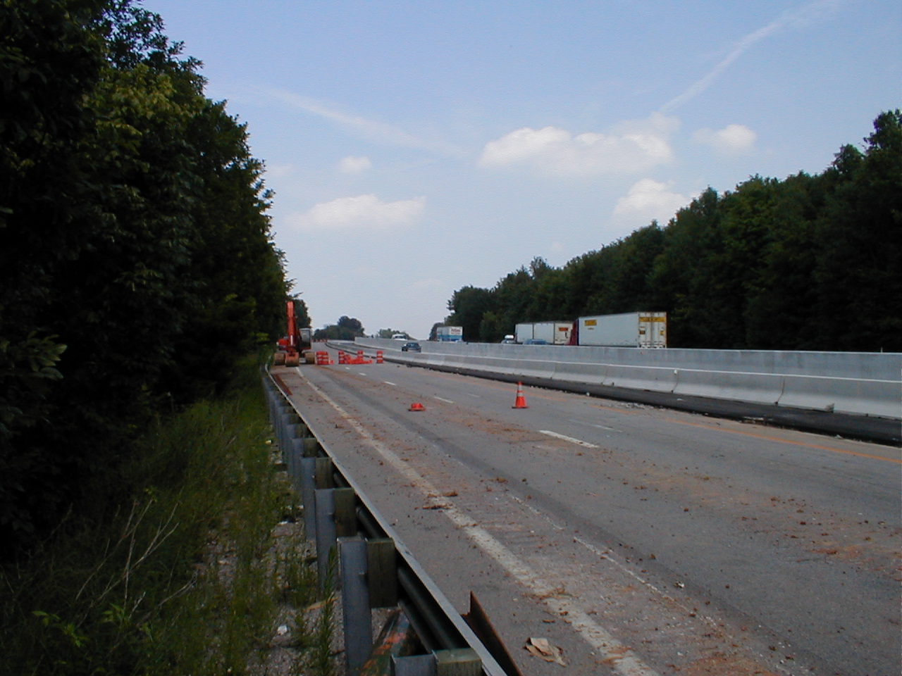 This shows the abandoned south bound lanes, the temporary south bound lanes which are divided by a Jersey barricade, and the north bound lanes.