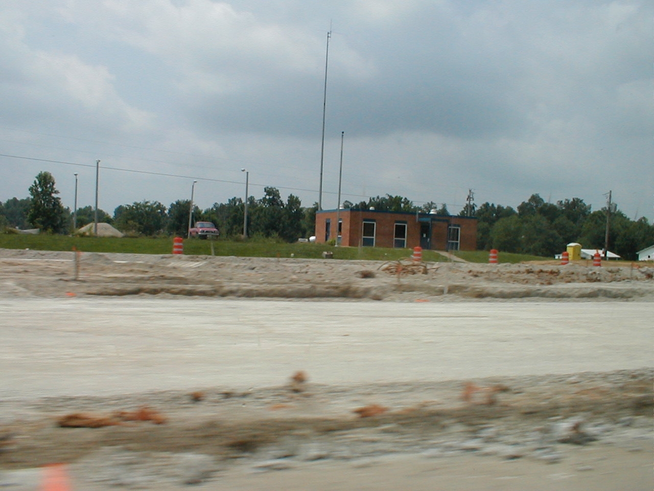 Construction work to remove the western toll booth. The toll booth office is visible.