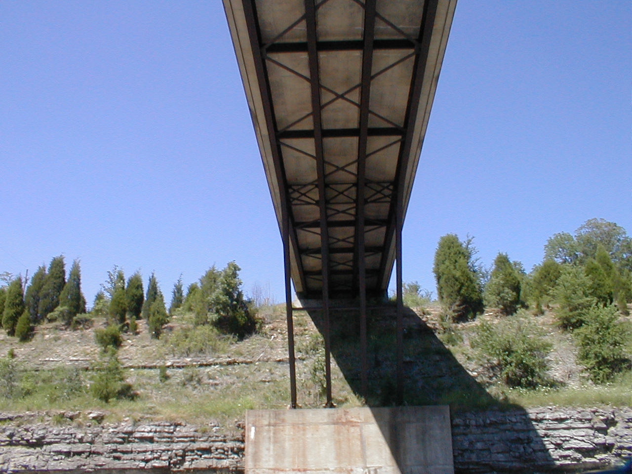 A view of the underside and supports of the bridge.
