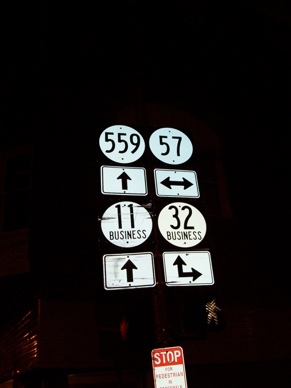 Unusual route markers for KY 11 and KY 32 business routes in Flemingsburg.